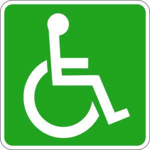 biały, graficzny znak osoby niepełnosprawnej na zielonym tle